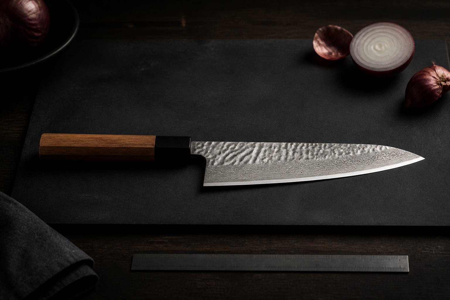 Japanese gyuto knife side profile showing its long edge and pointed tip